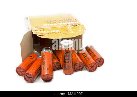 Old Eley Grand Prix 12-bore High Velocity paper case shotgun cartridges and box on a white background. England UK GB Stock Photo