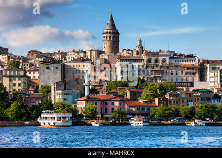 Istanbul city skyline in Turkey, Beyoglu district old houses with Galata tower on top, view from the Golden Horn. Stock Photo
