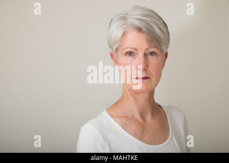 Attractive senior lady with grey hair Stock Photo