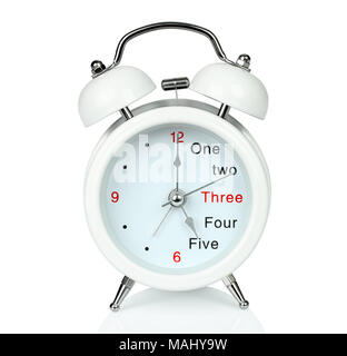 White alarm clock on white background close-up Stock Photo