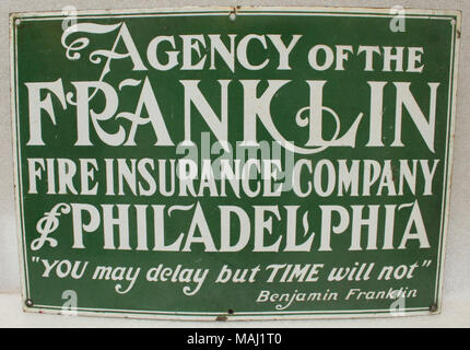 Green enamelled steel trade sign with white lettering advertising Franklin Fire Insurance Company in Philadelphia Title: Trade Sign for Franklin Fire Insurance Company, Philadelphia  . after 1890. Stock Photo