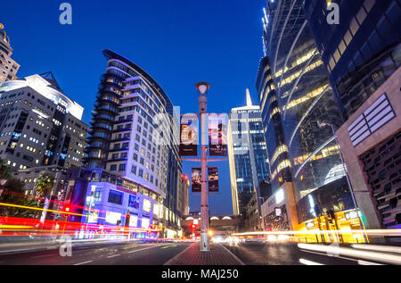 Johannesburg, South Africa, March 29-2018: Long exposure of busy city street with modern buildings in skyline. Stock Photo