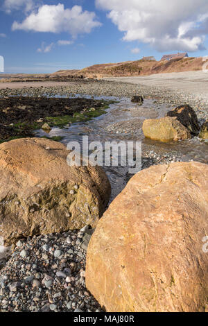 Rocks on the beach at Porth Trwyn, Anglesey, North Wales Stock Photo