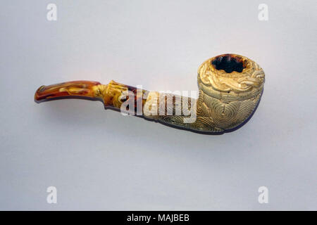 Ornate Meerschaum smoking pipe against white background, in Turkey Stock Photo