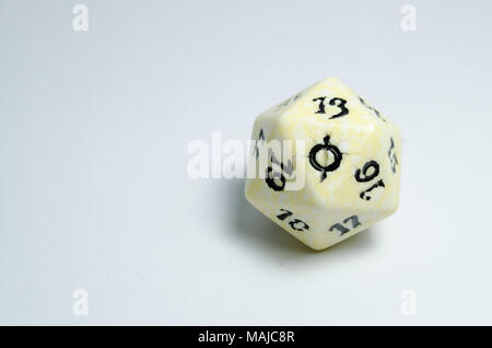 twenty-sided dice, isolated on a white background. symbol in focus. dice of role playing game Stock Photo