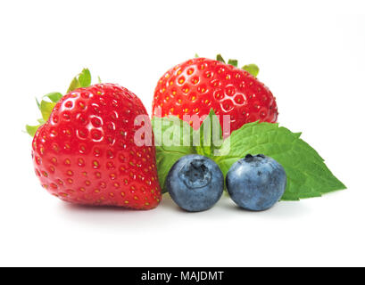 fresh forest fruits, isolated on white background. Ripe strawberries and blueberries with mint leaf,  fruit decoration. Stock Photo