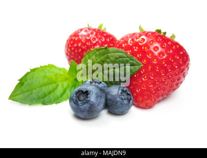 fresh forest fruits, isolated on white background. Ripe strawberries and blueberries with mint leaf,  fruit decoration. Stock Photo