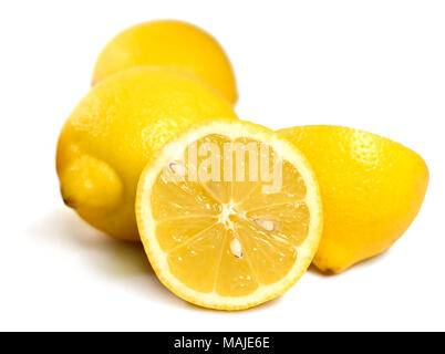Fresh lemons, isolated on white background. Arrangement of ripe citrus fruits. Stock Photo
