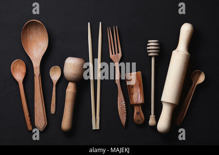 Various wooden kitchen utensils photographed from above, close-up Stock Photo