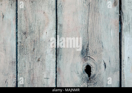Old gray wood texture with hole for background. Vintage background from a wooden vertical shabby plank. Grey wood texture. Background old panels. Stock Photo