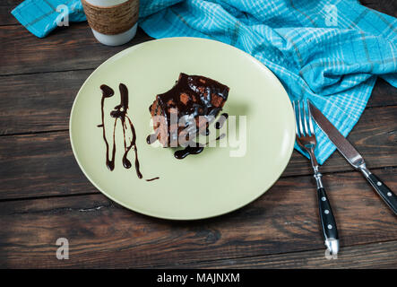 Delicious chocolate cakes on wood table close-up. Stock Photo