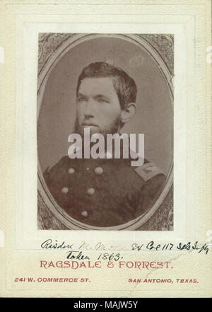 Bust portrait of Risdon M. Moore in uniform, turned slightly to the left, and surrounded by a printed frame. 'Risdon M. Moore Ex Col 117 Ills Inft Taken 1863.' (written below image). 'RAGSDALE & FORREST, 241 W. COMMERCE ST. SAN ANTONIO, TEXAS.' (printed below image). Title: Risdon M. Moore, Ex Colonel, 117th Illinois Infantry (Union).  . 1863. Ragsdale and Forrest, San Antonio, Texas Stock Photo