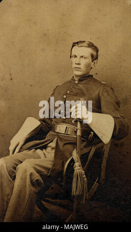 Full-length portrait of a man in uniform, sitting with a sword. 'Christian Hoffmeister 1st Lt Co K. 2 Infty Mo Vols Gift of Mrs. Elizabeth Grafe July 1929.' (written on reverse side of image). Lt. Hoffmeister was a member of companies C, B, and K of the 2nd Missouri Volunteer Infantry, US (Hewitt 1998: 372). His regiment fought at Pea Ridge, Perryville, Chickamauga, Chattanooga, Stone's River, Missionary Ridge, and the Atlanta campaign (The Union Army vol. IV, 1998: 257). Title: Christian Hoffmeister, Lieutenant, 2nd Missouri Volunteer Infantry (Union).  . between 1861 and 1865. Stock Photo