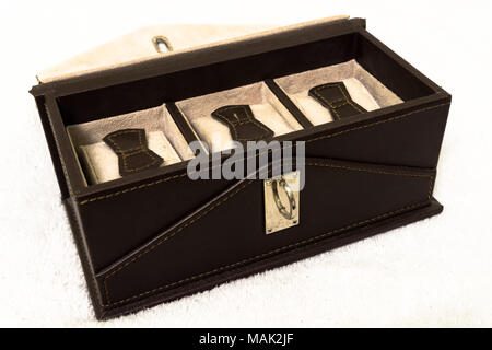 Luxury watch gift box. Personal, present. Empty and sewn watch box in leather fabric with lock Stock Photo