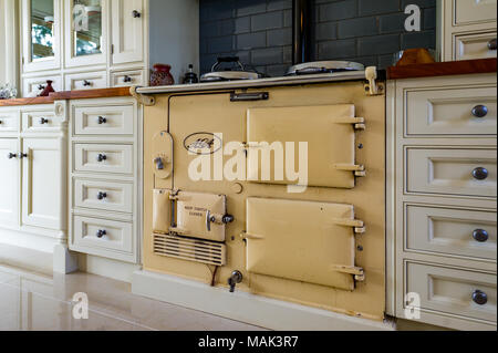 Traditional AGA range cooker in a domestic kitchen. Stock Photo