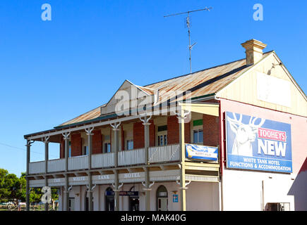 View of the iconic The White Tank Hotel, an outback pub built in 1914 in West Wyalong, NSW, Australia. The hotel takes its name from the tank which wa Stock Photo