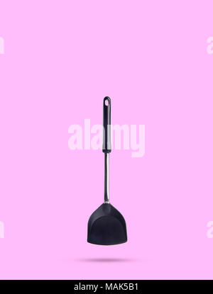 kitchen utensils or spade of frying pan on background Stock Photo