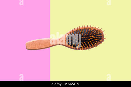 Hairbrush or Wooden Hairbrush on a background Stock Photo