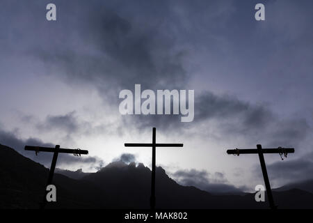 Cross, crucifix, at the Calvary scene set up on a moody, cloudy Good friday for the Passion Play in the Plaza de Espana, Adeje, tenerife, Canary islan Stock Photo