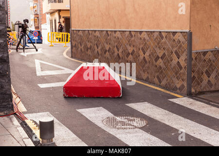 Large concrete blocks used as security devices to prevent traffic incursions on to a public event and protect against potential terrorist vehicular at Stock Photo
