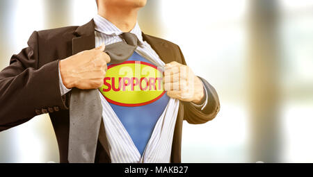 businessman in superhero costume in help and support , client service Stock Photo