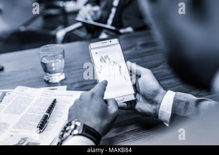 Close up of businessman using mobile smart phone. Stock Photo