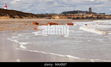 The remains of the Low Light Lighthouse on the beach at Happisburgh in Norfolk England UK Stock Photo