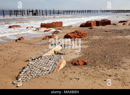 The remains of the Low Light Lighthouse on the beach at Happisburgh in Norfolk England UK Stock Photo