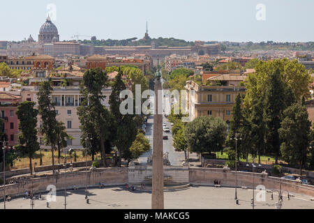 View from Terrazza del Pincio looking across Piazza del Popolo, which has the cities oldest obelisk at it's centre, and the rooftops of buildings towa Stock Photo