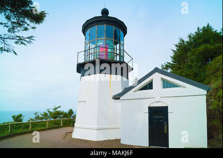 Cape Meares Lighthouse first lit in 1890 on the Northern Oregon Coast near Netarts, Oregon Stock Photo
