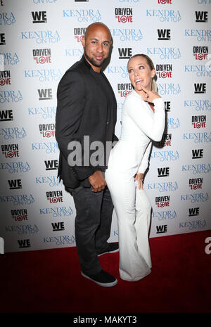 ***FILE PHOTO*** KENDRA WILKINSON ANNOUNCES SPLIT FROM HANK BASKETT West Hollywood, CA - March 31 Hank Baskett, Kendra Wilkinson Attending WE tv Celebrates The Premiere Of 'Kendra On Top' And 'Driven To Love' at Estrella Sunset On March 31, 2016. Credit: RTNSadou/MediaPunch Stock Photo