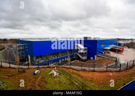 Exeter, Devon, UK. 2nd April 2018.  Constuction of the new £80 million IKEA store at Newcourt Way at Exeter in Devon approaching completion ahead it opening on 10th May.  Originally it was announced that it would open on May 1st but the opening has been delayed by 10 days due to the recent 'Beast from the East' cold spells March.  It is the 21st IKEA store to open in the UK and will be the retailers most sustainable store to date.  Picture Credit: Graham Hunt/Alamy Live News Stock Photo