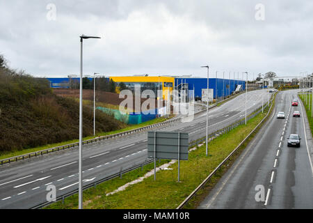Exeter, Devon, UK. 2nd April 2018.  Constuction of the new £80 million IKEA store at Newcourt Way at Exeter in Devon approaching completion ahead it opening on 10th May.  Originally it was announced that it would open on May 1st but the opening has been delayed by 10 days due to the recent 'Beast from the East' cold spells March.  It is the 21st IKEA store to open in the UK and will be the retailers most sustainable store to date.  Picture Credit: Graham Hunt/Alamy Live News Stock Photo