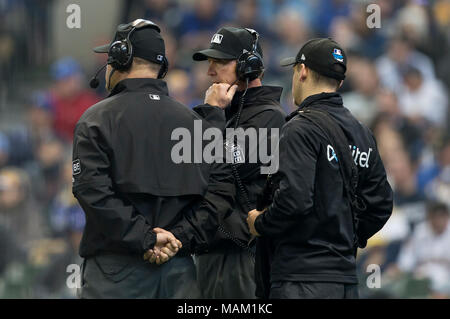 Milwaukee, WI, USA. 2nd Apr, 2018. Umpires review a call during the Major League Baseball game between the Milwaukee Brewers and the St. Louis Cardinals at Miller Park in Milwaukee, WI. Cardinals defeated the Brewers 8-4. John Fisher/CSM/Alamy Live News Stock Photo