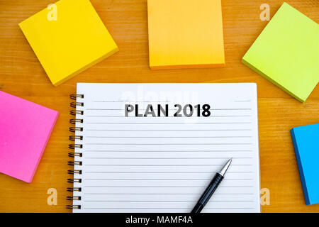 Plan 2018 Notebook business team meeting  with an Plan 2018 Stock Photo