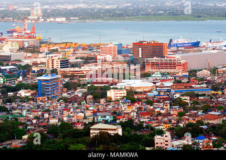 Aerial view of Cebu City looking east, with port and Mactan Channel beyond, Philippines Stock Photo
