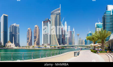 Dubai - The promenade of Marina and the mosque. Stock Photo