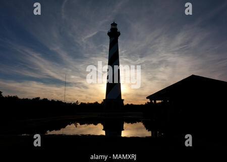 Cape Hatteras Lighthouse at dusk with wispy clouds in background Stock Photo