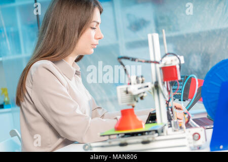 Professional female engineer working with 3d printing Stock Photo