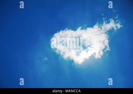 Heart shaped cloud in the blue sky Stock Photo