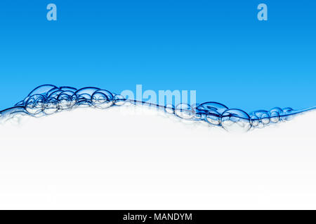 Water and air bubbles over white background Stock Photo