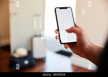 Man Using Online App To Book Cab For Vacation Stock Photo