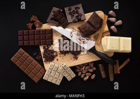 Chocolate handmade candies on a kitchen table Stock Photo