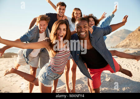 Portrait Of Friends Having Fun Together On Beach Vacation Stock Photo