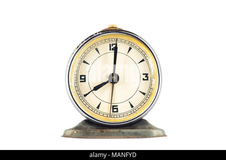 Big old vintage alarm clock isolated on white background Stock Photo