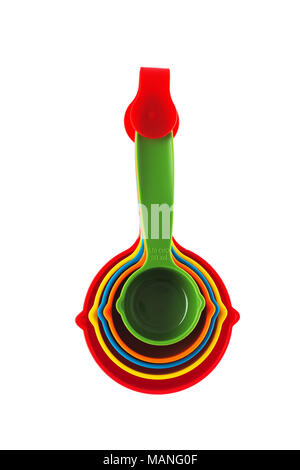 Color plastic dosing spoons isolated on a white background Stock Photo