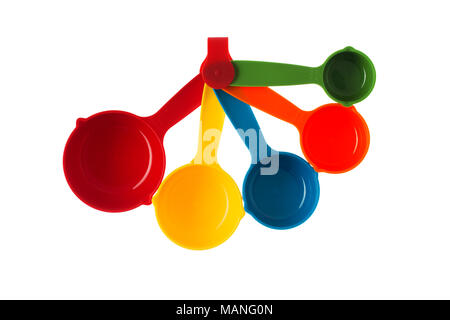 Color plastic dosing spoons isolated on a white background Stock Photo
