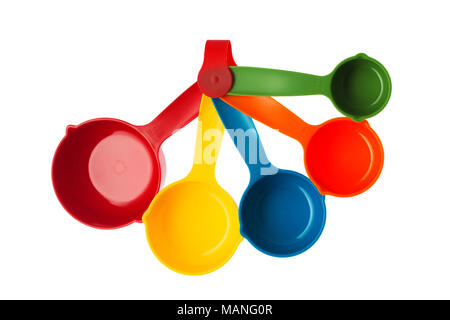 Color plastic dosing spoons isolated on a white background Stock Photo