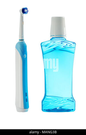 Plastic bottle of mouthwash and electrical toothbrush isolated on white background Stock Photo