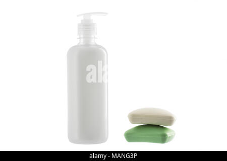 Bottle of liquid soap and two bars of soap isolated on white background. Healthcare concept. Stock Photo